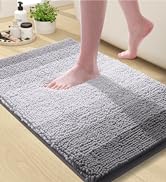 grey and white bathroom rug