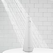 White Cordless Pulse Water Flosser WF-20 in Shower