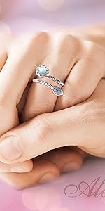 Silver spiral leaf ring with white opal