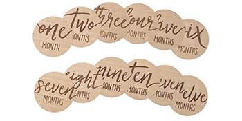 Six double sided wooden milestone discs